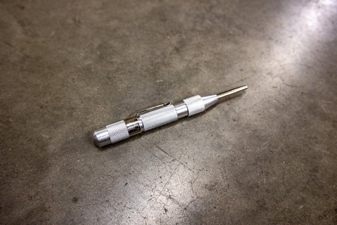 Spring Loaded Window Punch